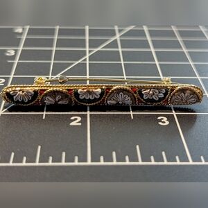 Vintage Gold and Black Brooch with Intricate Design